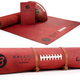 Illustration for article titled This $1,000 Yoga Mat Made From Genuine NFL Football Leather Probably Smells Amazing